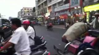 Phnom penh trafficon on a tuktuk