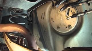 How to change the fuel pump in a 2001 Mercury Grand Marquis without taking the tank out.