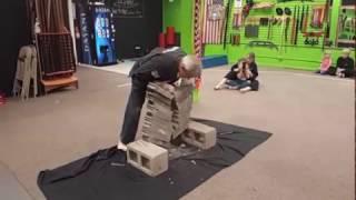 Grand Master 8th Degree Black Belt David Sheffield Breaks Ten Bricks.