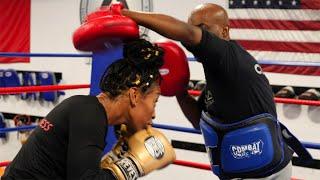 Coach Basheer Abdullah Working Mitts with Raquel Miller