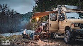 Van Camping Flowing River Camp Fire Wood Splitting Cooking and Whiskey