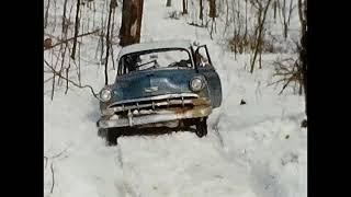 1954 Chevy station wagon - snowy mountain road. Digitized