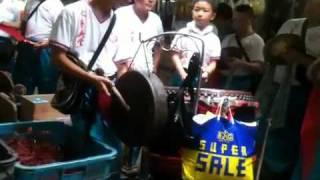 Lion dance Singapore  2011- little drummer boy and his younger brother