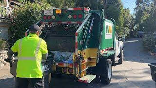 Waste Management- Mini Rear Loader Eating Garbage