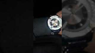 silver iced out Elgin watch