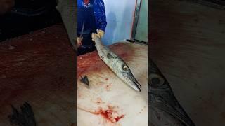 Removing fish scales with a knife and slicing