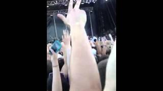 Macklemore singing Can't Hold Us while walking on crowd