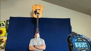 Guinness record for standing guitar on chin - Public TV Facts