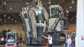 Massive Liebherr R9400 Leaving Exhibition Hall