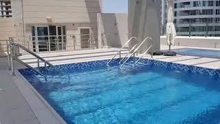 Real Estate in Abu Dhabi: Summer plunge at this beautiful swimming pool area at Boardwalk Residence