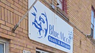 Book shopping at Blue Moon Books & Antiques in Stevens Point, WI