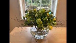 Spring hand tied in fish bowl vase