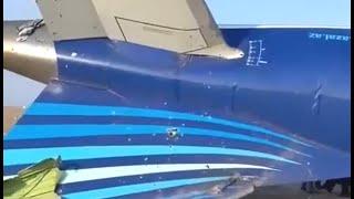 Следы осколков на самолете Embraer 190 упавшем в  Казахстане