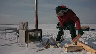 WINTER CAMPING. ARCTIC DINNER IN THE SNOW