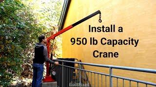 Crane build for moving machines into basement. Move woodworking machines into a basement with crane