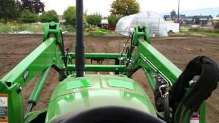 John Deere 4066R with 665 Tiller