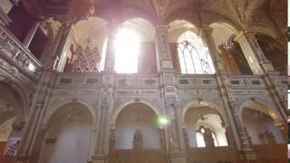 Panning lens flare shot of the interior of a church in Copenhagen, Denmark