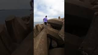 Running  on Tetrapods rocks #youtubeshorts #ytshorts #shorts