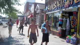 Walking Tour Rehoboth Beach Delaware Boardwalk on a hot summer afternoon