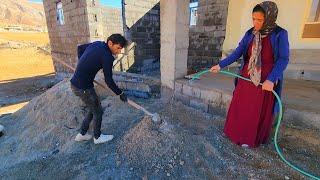 "Preparing the wall in front of the house and behind the house for insulation"