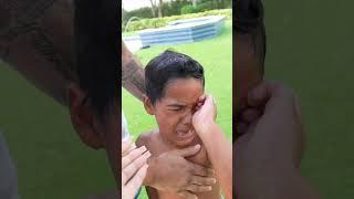 Son gets hurt while playing football with dad #shorts