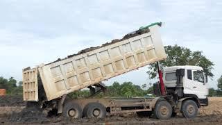 Strong Power Dump Truck Unloading Dirt Best Landfilling Operation Bulldozer Pushing Dirt