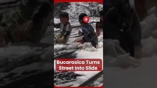 Colombian Town Turns Street Into Giant Water Slide to Spread Joy and Positivity