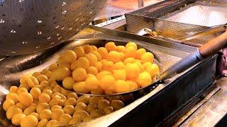 Awesome "Sweet Potato Balls" Street food in Taiwan night market. amazing how they get bigger & round