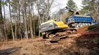 Vovlo Ec210 Excavator Loading Pond Mud