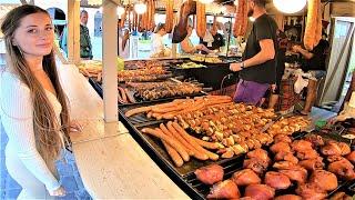 Street Food in Krakow, Poland. Huge Sausages, Pork Knuckles, Steaks, Skewers and more