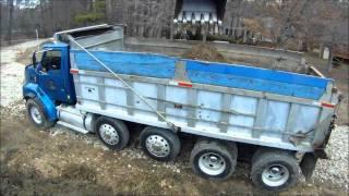 Excavator Loading Mud