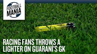 Racing Fans Throws a Lighter on Guaraní's GK