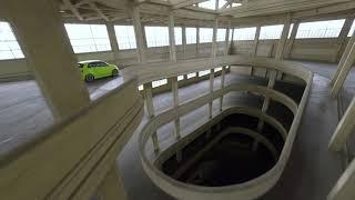 Abarth 500e driving in/on the legendary Lingotto plant