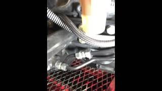 How to change oil in a Mahindra Max 24HST