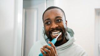 How to use an electric toothbrush - Dentist explains