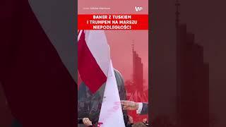 Charakterystyczny baner z D. Tuskiem i D. Trumpem na Marszu Niepodległości w Warszawie