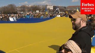 JUST IN: Protesters Unfurl Large Ukrainian Flag In Front Of The White House