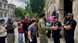 POLICE Tells  “DON’T TOUCH MY WEAPON!“ RUDE IDIOT Group DISRESPECTS the king’s Guard and POLICE