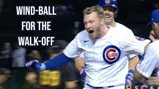 Ian Happ plays the wind for the walk off, a breakdown