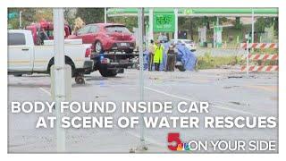 Body found inside of a car at scene of water rescues Tuesday