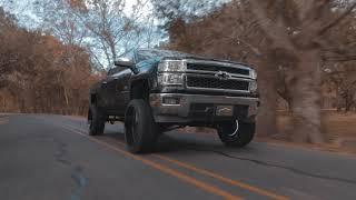 Chevy 1500 With 7.5" Rough Country Lift and 26x12 Hardcore HC17 wheels on 35x13.50r26 RBP M/T!