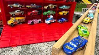 18 Disney CarsPlay in the park and store them in a Mack trailer truck