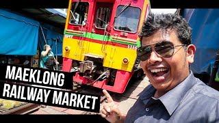 Dangerous Train Market - Maeklong Railway Market at Bangkok, Thailand