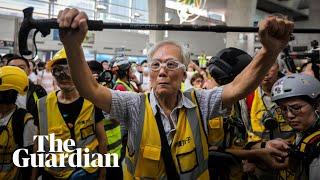 Uncle Wong, 82: protecting Hong Kong protesters with his walking stick