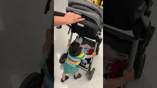 Baby pushing his stroller in Walmart #adorablebaby #babyawsome #cute #cleverbaby #babyboy #cutebaby