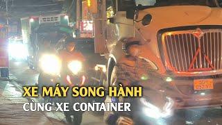 Khiếp vía cảnh xe máy song hành cùng xe container