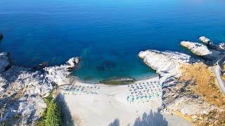 Ammoudi beach, Crete, turquoise waters and spectacular white coarse sand, 4K drone footage