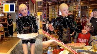 Robot-dancing waitress shocks diners in China