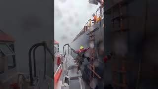 Ship Pilot boarding in extreme weather condition