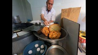 #TunisianStreetFood About 100  years old Tunisian "Beignet" or Ftayir Tunisian  in medina, Sfax